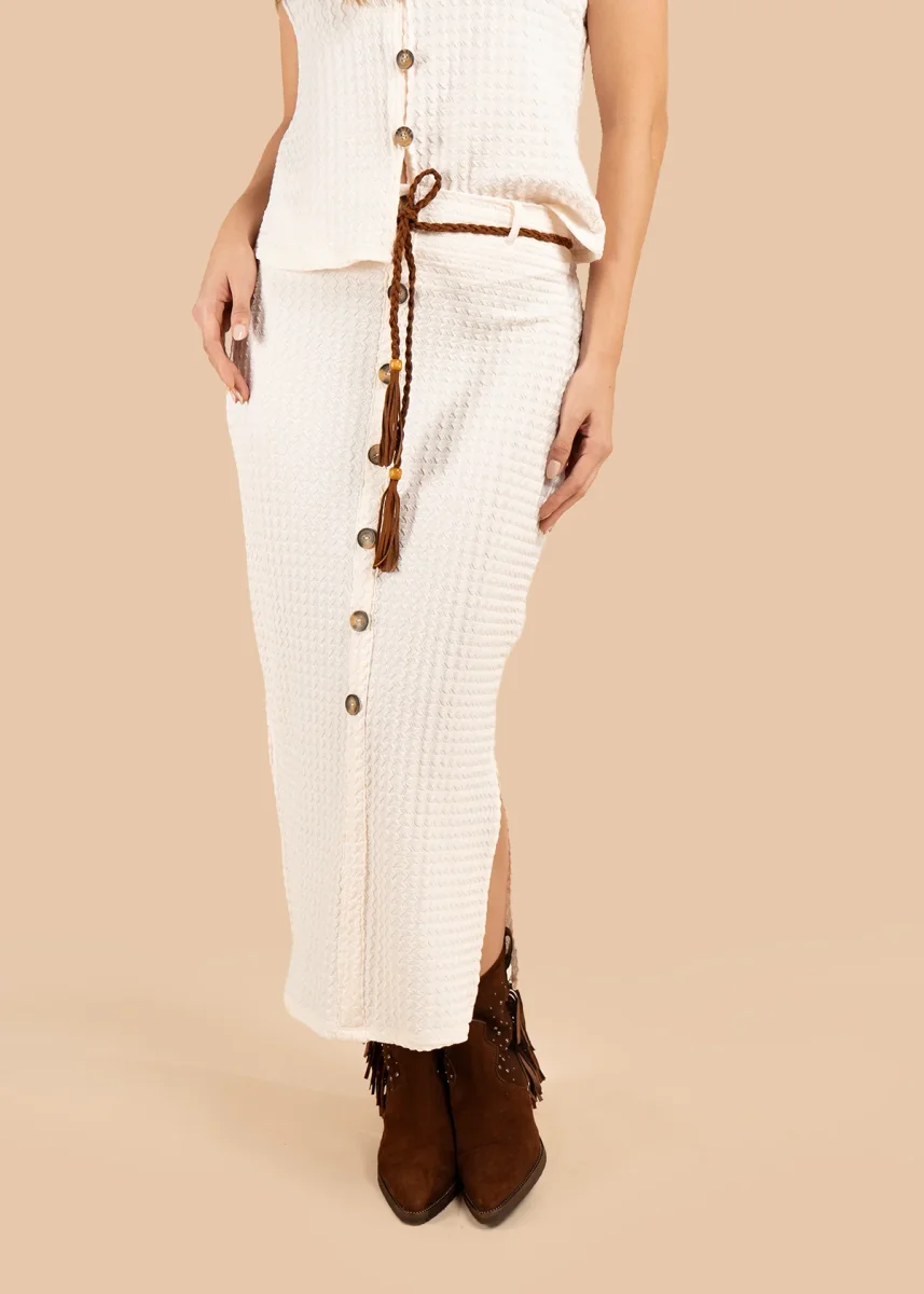 Falda color beige con textura y lazo con borlas 105831